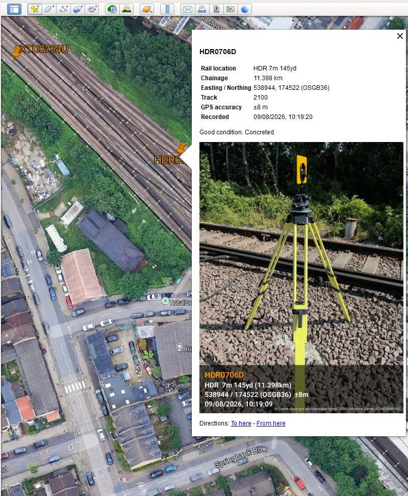 An exported Site Notes pin open in Google Earth on a PC, showing its rail location, grid reference and photo.